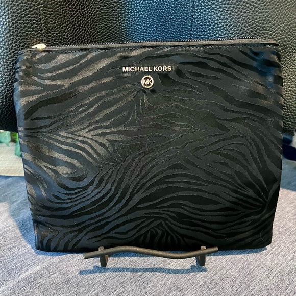 Michael Kors Handbags - Michael Kors MK Black Animal Print Cosmetic Toiletry Bag NEW Slick Look. Zip Bag